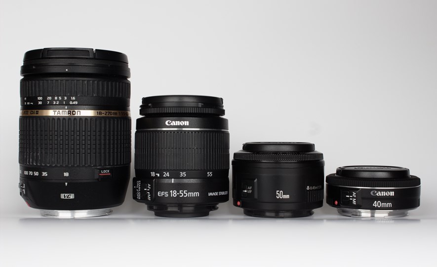 From the left: Tamron 18-270 3.5-6.3 DI II VC, 
Canon EF-S 18-55mm f/3.5-5.6 IS II (kit lens), Canon EF 50mm 1:1.8 II and the Canon EF 40mm f/2.8. The Tamron and the kit lens are both zoom lenses, while the 40mm and the 50mm are primes.