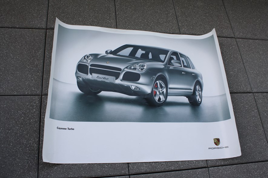 Got this poster for free from the Porsche museum in Stuttgart. Any poster will do though.
