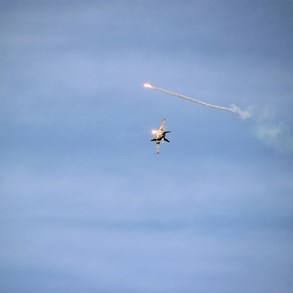 F-18 Hornet dropping flares.