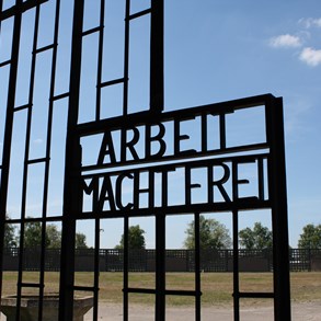 At the Sachsenhausen concentration camp. The sign reads &quot;Work liberates&quot;.