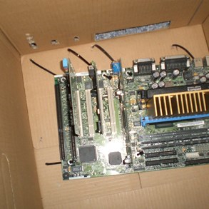 Putting the motherboard in place.