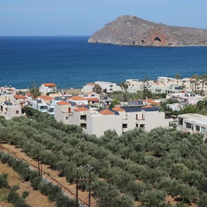 The city of Platatias with the island Thodorou in the background, wagely resembling a turtle about to bite.